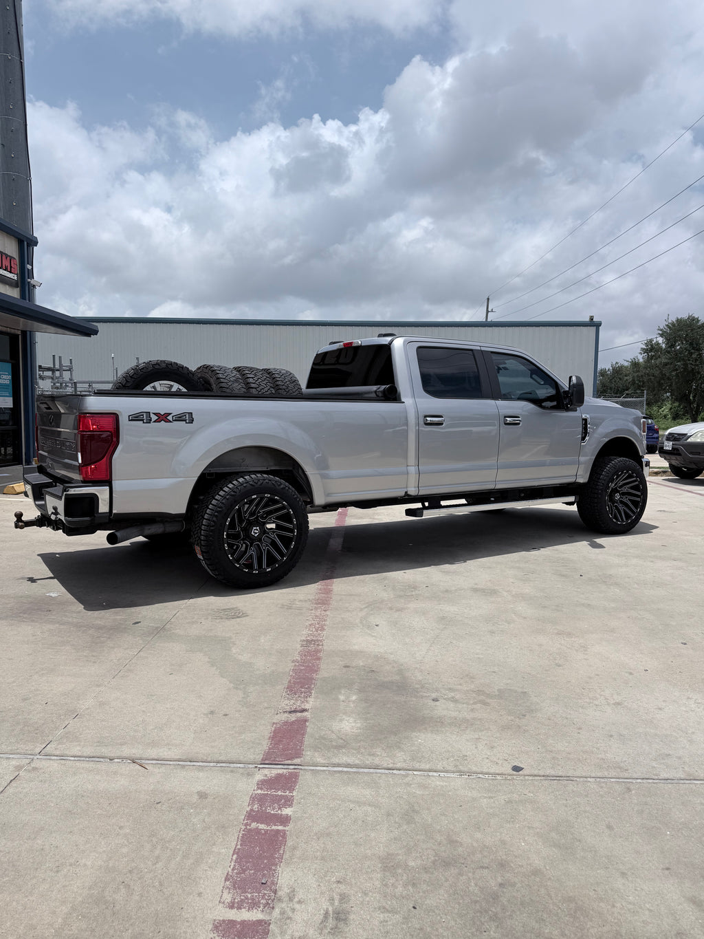 2015 - 2021 FORD F-250 WITH 22X12 TIS 554BM WHEELS AND 35X12.50R22 RT TIRES - GALLERY