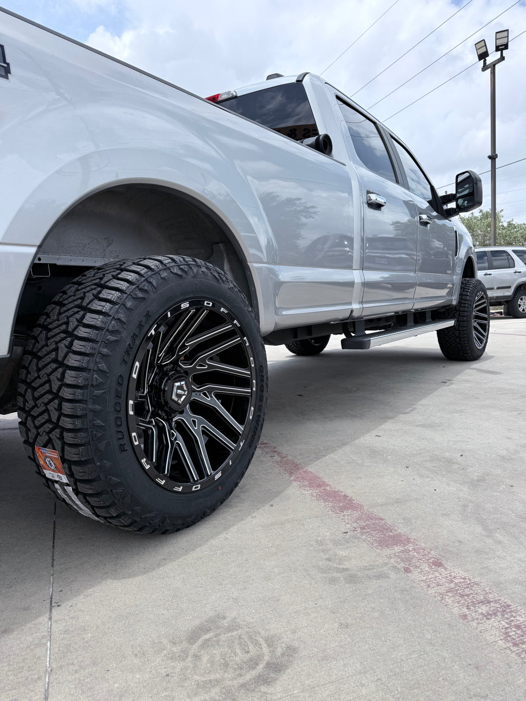 2015 - 2021 FORD F-250 WITH 22X12 TIS 554BM WHEELS AND 35X12.50R22 RT TIRES - GALLERY