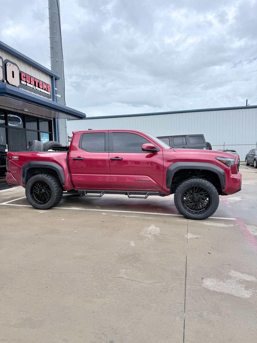 2024 - 2027 TOYOTA TACOMA WITH 20X10 TIS 553B OFF-ROAD WHEELS AND 33X12.50R20 RT TIRES - GALLERY